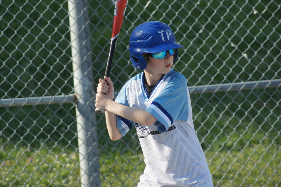 With the game tied 9-9, Harrison (13) exercised great patience at the plate to draw a one out bases loaded RBI walk in the bttom of the fourth inning that brought Aysha (7) home with the Jays winning run over the Royals.