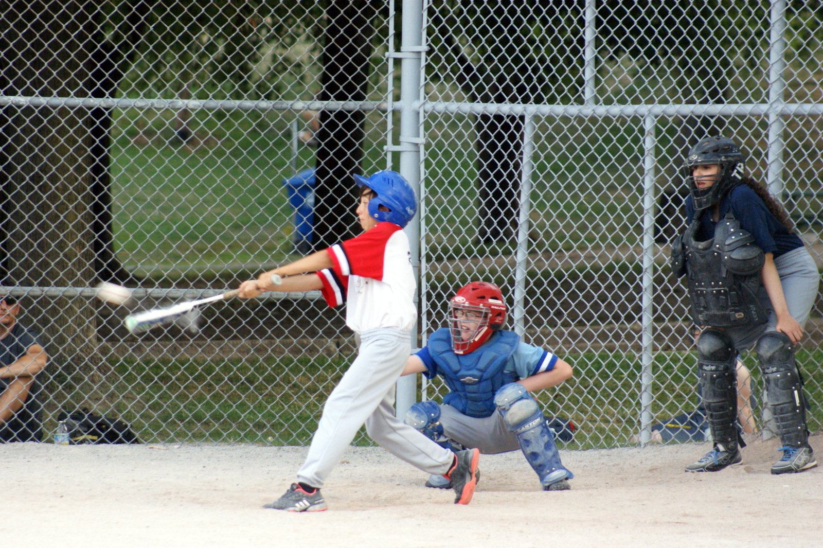 RED SOX POWER > Vincent (4) connects for a 2 RBI double against the Royals in the top of the fourth inning during a Mosquito Division Round Robin Tournament Game at Christie Pits Diamond 3. Vincent powered the Red Sox offense by going 3 for 3 [two doubles, single] at the plate with two runs scored and 4 RBI's. Vincent also pitched a scoreless first inning while striking out two.